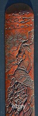Fine antique Japanese Meiji Period carved bamboo page turner with peacocks