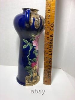 Japanese satsuma 17 handled floor vase enameled hand painted. Circa Unknown