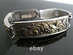 Menuki japonais antique en shakudo avec des oiseaux et des animaux sur un bracelet en argent sterling de l'ère Meiji